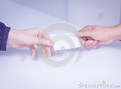 Hands with business card Stock Photo